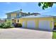 Two-car garage with a concrete driveway and additional storage at 546 Rio Vista Ave, Daytona Beach, FL 32114