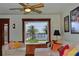 Living room with large window offering beautiful water views and a private dock at 546 Rio Vista Ave, Daytona Beach, FL 32114