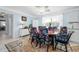 Bright dining room featuring a charming table and floral chairs at 106 Sundance Trl, Ormond Beach, FL 32176