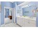 Bright bathroom with double vanity and view of bedroom at 1333 Asher Ct # 1333, Ormond Beach, FL 32174