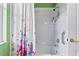 Bathroom featuring a shower/tub and colorful shower curtain at 1333 Asher Ct # 1333, Ormond Beach, FL 32174