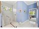Walk-in shower with hexagonal tiles and built-in seat at 1333 Asher Ct # 1333, Ormond Beach, FL 32174