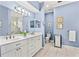 Bathroom with double vanity, large mirror, and tiled flooring at 1333 Asher Ct # 1333, Ormond Beach, FL 32174