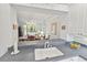 Kitchen with a pass-through window to the dining room and white cabinets at 1333 Asher Ct # 1333, Ormond Beach, FL 32174