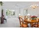 Living room features access to a relaxing screened porch at 1333 Asher Ct # 1333, Ormond Beach, FL 32174