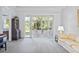 Living room with a view of the screened porch and backyard at 1333 Asher Ct # 1333, Ormond Beach, FL 32174