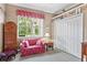 Charming sitting area with floral couch and built-in storage at 1333 Asher Ct # 1333, Ormond Beach, FL 32174