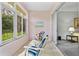 Sunroom with access to backyard and living room at 1333 Asher Ct # 1333, Ormond Beach, FL 32174