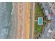 Overhead view of condo building, pool, and beach access at 2700 Ocean Shore Blvd # 508, Ormond Beach, FL 32176