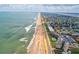 Aerial view of beachfront property, showing building, pool, and beach access at 2700 Ocean Shore Blvd # 508, Ormond Beach, FL 32176