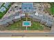 Top-down view of beachfront condo building with pool and parking at 2700 Ocean Shore Blvd # 508, Ormond Beach, FL 32176