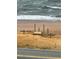 Private beach access with wooden walkway leading to the sand at 2700 Ocean Shore Blvd # 508, Ormond Beach, FL 32176
