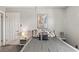 Bedroom with a bed, nightstands, and a door at 2700 Ocean Shore Blvd # 508, Ormond Beach, FL 32176