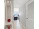 Condo entryway, showing a coat rack and access to living space at 2700 Ocean Shore Blvd # 508, Ormond Beach, FL 32176