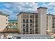 Condo building exterior showcasing ocean views and balconies at 2700 Ocean Shore Blvd # 508, Ormond Beach, FL 32176