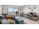 Living room with ocean view, comfy seating, and dining table at 2700 Ocean Shore Blvd # 508, Ormond Beach, FL 32176