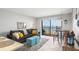 Living room with ocean view and access to balcony at 2700 Ocean Shore Blvd # 508, Ormond Beach, FL 32176