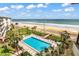 Elevated view of refreshing pool area with stunning ocean backdrop at 2700 Ocean Shore Blvd # 508, Ormond Beach, FL 32176
