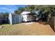 Large backyard with shed and RV cover at 445 E Rosehill Ave, Deland, FL 32724