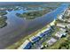 Aerial view of villas and the surrounding river, highlighting waterfront access at 53 Ocean Palm Villa S # 53, Flagler Beach, FL 32136