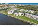 An aerial view showcasing the property's location within the community, highlighting proximity to the water at 53 Ocean Palm Villa S # 53, Flagler Beach, FL 32136