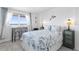 Ocean-view bedroom with a comfortable bed and work space at 89 S Atlantic Ave # 1401, Ormond Beach, FL 32176