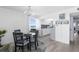 Ocean view dining area, kitchen access, round table at 89 S Atlantic Ave # 1401, Ormond Beach, FL 32176