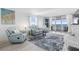 Relaxing living room with ocean view and comfy seating at 89 S Atlantic Ave # 1401, Ormond Beach, FL 32176