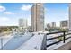 Aerial view of condo complex, pool, and surrounding buildings at 1 Oceans West Blvd # 5B3, Daytona Beach, FL 32118