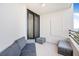 Relaxing balcony with outdoor furniture and partial water views at 1 Oceans West Blvd # 5B3, Daytona Beach, FL 32118