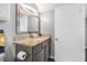 Bathroom with granite countertop and modern vanity at 1 Oceans West Blvd # 5B3, Daytona Beach, FL 32118