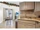 Kitchen with granite countertops and updated cabinetry at 1 Oceans West Blvd # 5B3, Daytona Beach, FL 32118