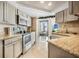 Updated kitchen with stainless steel appliances and ocean view at 1 Oceans West Blvd # 5B3, Daytona Beach, FL 32118
