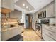 Modern kitchen with granite counters and stainless steel appliances at 1 Oceans West Blvd # 5B3, Daytona Beach, FL 32118