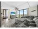 Spacious living room with large windows and ocean view at 1 Oceans West Blvd # 5B3, Daytona Beach, FL 32118