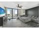 Living room with sectional sofa and stunning ocean view at 1 Oceans West Blvd # 5B3, Daytona Beach, FL 32118