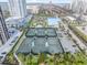Aerial view of condo complex tennis courts at 1 Oceans West Blvd # 5B3, Daytona Beach, FL 32118
