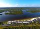 Aerial view of condo units with waterfront access and lush surroundings at 11 Ocean Palm Villa S # 11, Flagler Beach, FL 32136