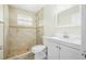 Clean bathroom with tile shower and white vanity at 656 Winchester St, Daytona Beach, FL 32114