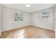 Light-filled bedroom featuring hardwood floors at 656 Winchester St, Daytona Beach, FL 32114