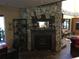 Stone fireplace in dining area at 2436 Cr 416N, Lake Panasoffkee, FL 33538