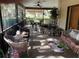 Relaxing screened porch with fountain at 2436 Cr 416N, Lake Panasoffkee, FL 33538