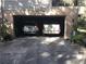 Two-car garage with ample space for vehicles and storage at 2436 Cr 416N, Lake Panasoffkee, FL 33538