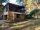 Two-story house with screened porch and attached garage at 2436 Cr 416N, Lake Panasoffkee, FL 33538