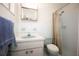 Small bathroom with light blue vanity and shower/tub combo at 9701 E Warm Springs Ave, Coleman, FL 33521