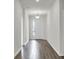 Bright and spacious entryway with wood-look tile flooring at 429 Silver Palm Dr, Haines City, FL 33844