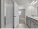 Double vanity bathroom with a walk-in shower at 429 Silver Palm Dr, Haines City, FL 33844