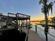 Lakefront property with a spacious dock, perfect for boat lovers at 1241 W Lakeshore Dr, Clermont, FL 34711