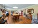 Game room featuring a pool table, hardwood floors, and bar area at 1241 W Lakeshore Dr, Clermont, FL 34711