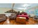 Spacious main bedroom with hardwood floors and sitting area at 1241 W Lakeshore Dr, Clermont, FL 34711